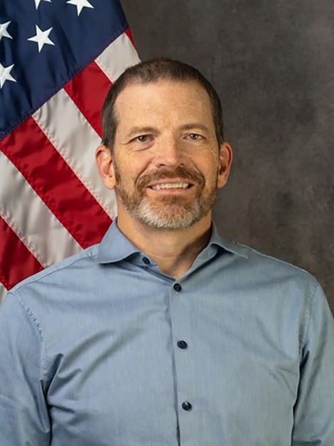 Headshot of Travis Chapman